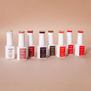 ‘Indian Summer 1944 Paris’ collection set: eight bottles of semi-permanent nail varnish lined up against a pinkish-beige background