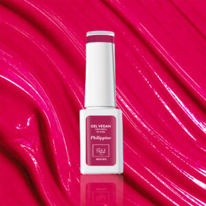 Flacon du Gel Vegan Philippine 1944 Paris sur une texture rose fuchsia brillante.