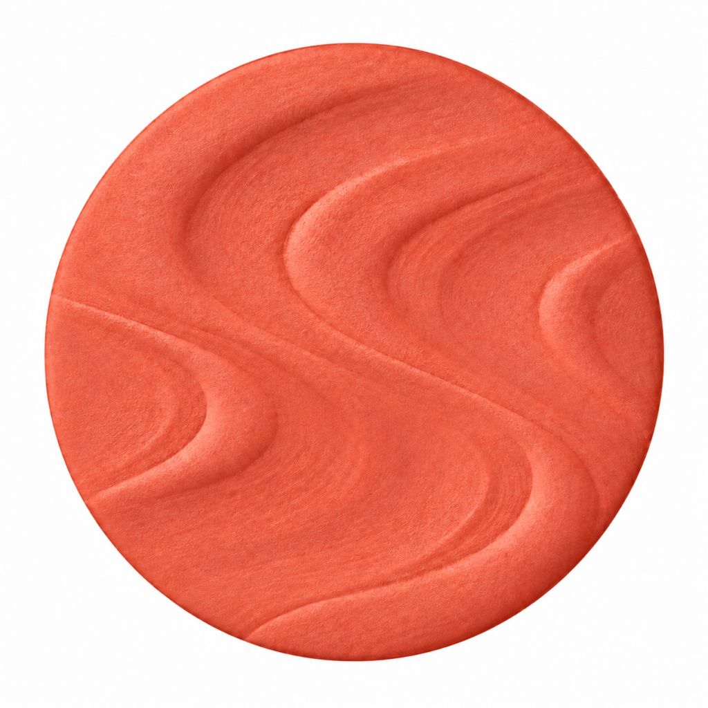Blush in polvere dalla texture corallo per dare un tocco di calore all’incarnato