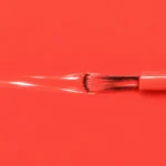 Liquid version of Betty’s vegan nail varnish, coral red shade (ref. 3VN299), 1944 Paris