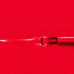 Liquid version of Adrienne vegan nail varnish, bright red shade (ref. 3VN301), 1944 Paris