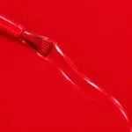 Liquid version of Eugénie vegan nail varnish, bright red shade (ref. 3VN311), 1944 Paris