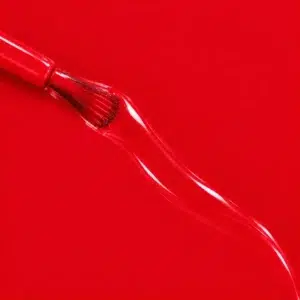 Liquid version of Eugénie vegan nail varnish, bright red shade (ref. 3VN311), 1944 Paris