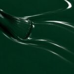 Liquid form of Marianne’s vegan semi-permanent nail varnish, dark green shade (ref. NGV1216), 1944 Paris
