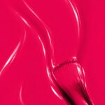 Liquid form of Ophélie vegan semi-permanent nail varnish, fuchsia shade (ref. NGV1238), 1944 Paris