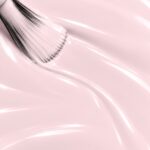 Liquid form of Mégane vegan semi-permanent nail varnish, pale pink shade (ref. NGV152), 1944 Paris