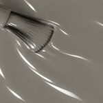 Liquid form of Bich vegan semi-permanent nail varnish, grey shade (ref. NGV158), 1944 Paris