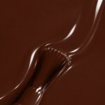 Liquid form of Giada vegan semi-permanent nail varnish, dark brown shade (ref. NGV266), 1944 Paris
