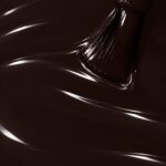 Liquid form of Sienna vegan semi-permanent nail varnish, dark brown shade (ref. NGV271), 1944 Paris